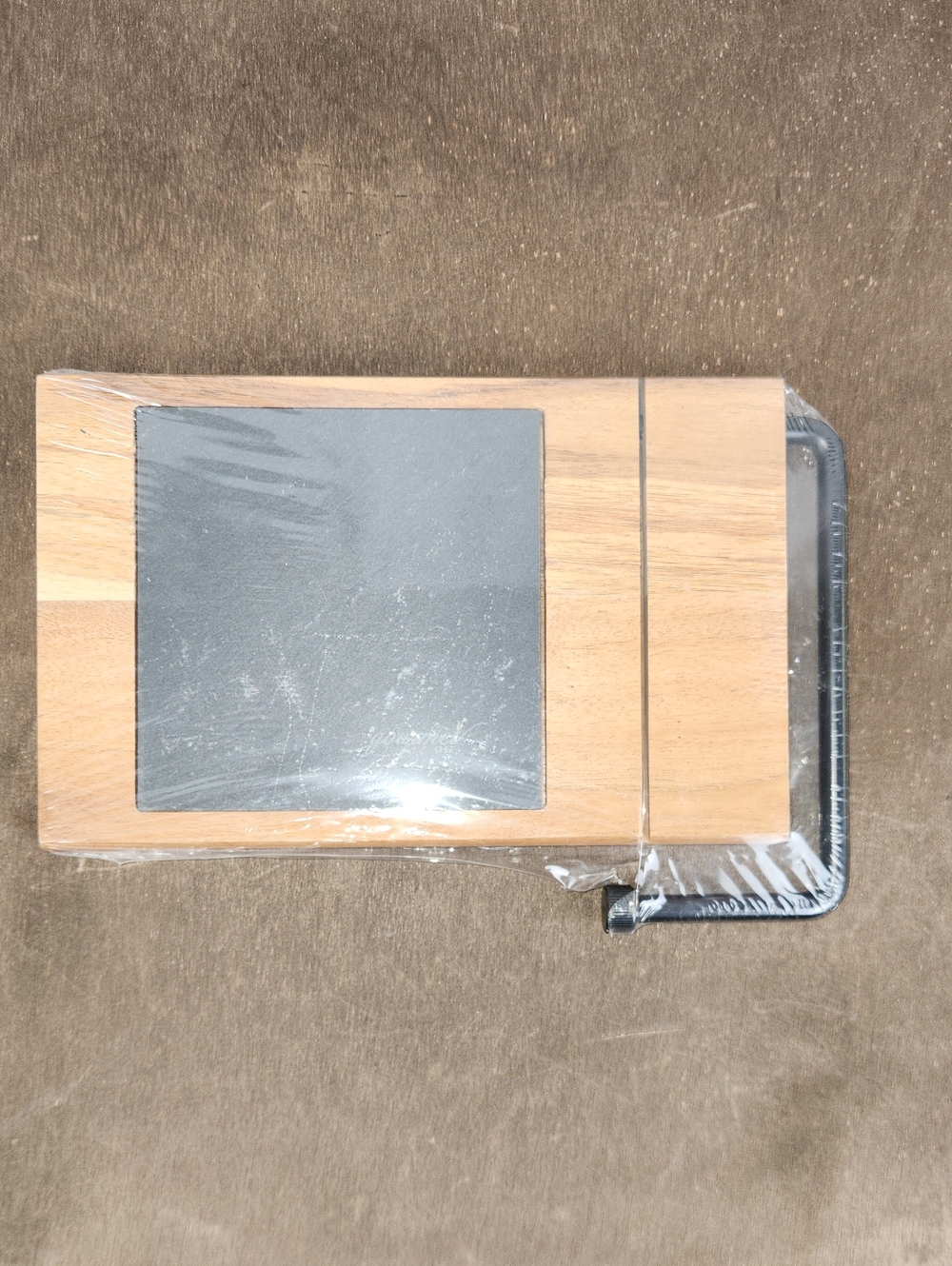 The Gourmet Wooden Cheese Board built-in wire slicer & slate insert.